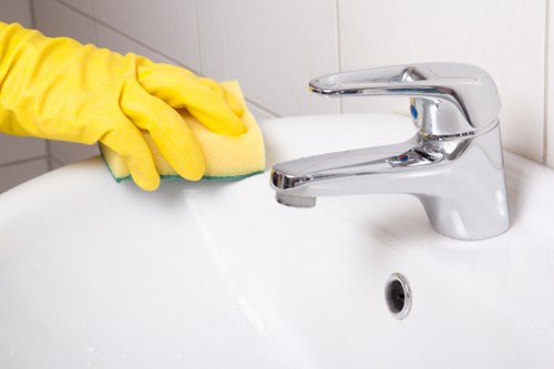 After builders cleaning in a newly renovated room with dust removal equipment